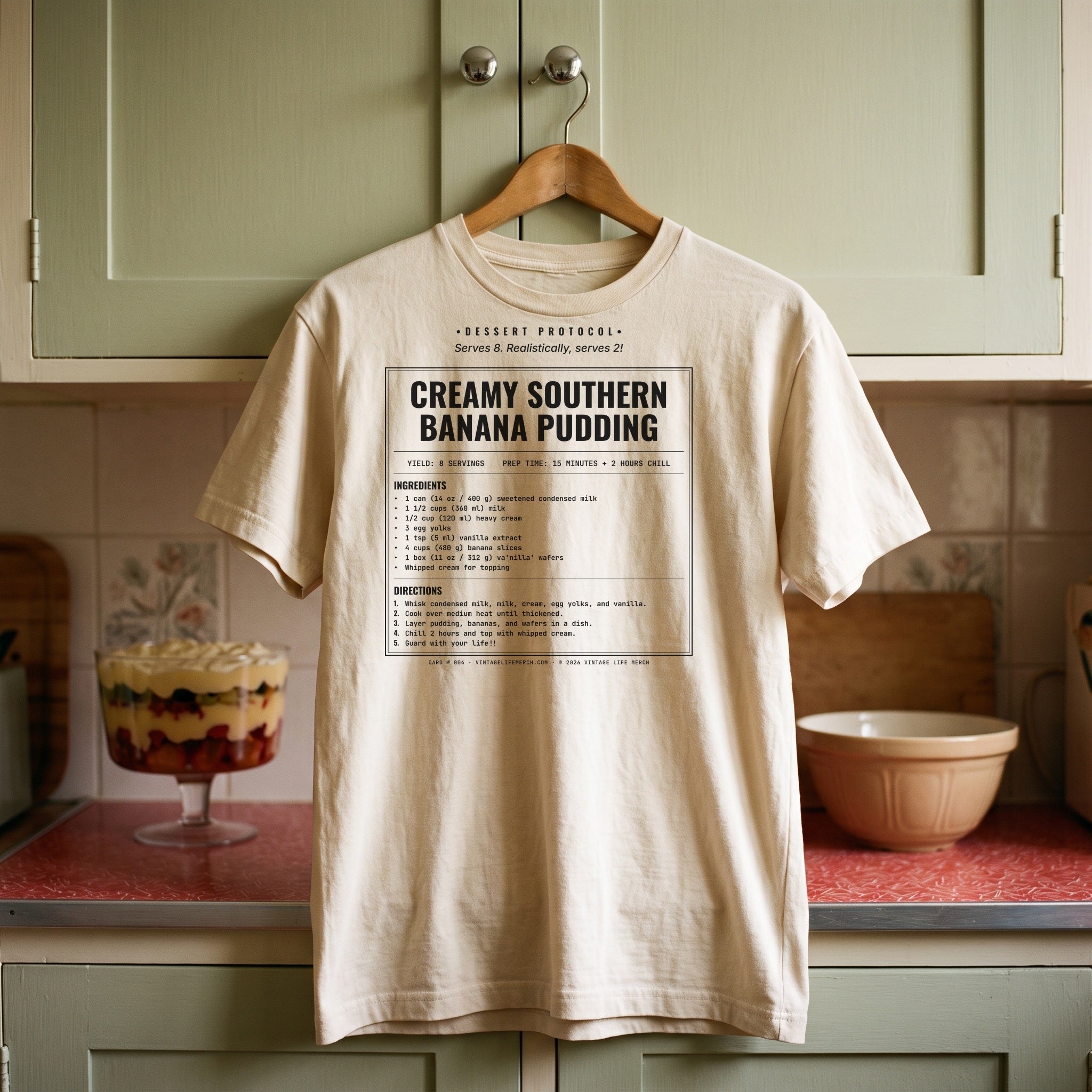 Creamy Southern Banana Pudding recipe shirt on a hanger in a vintage kitchen